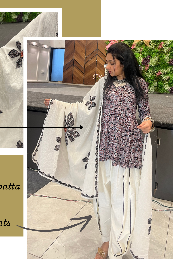 Black Peplum Mirage top with harem pants & applique work dupatta.